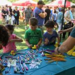 Decorating rubber ducks at the Tinicum Arts festival.